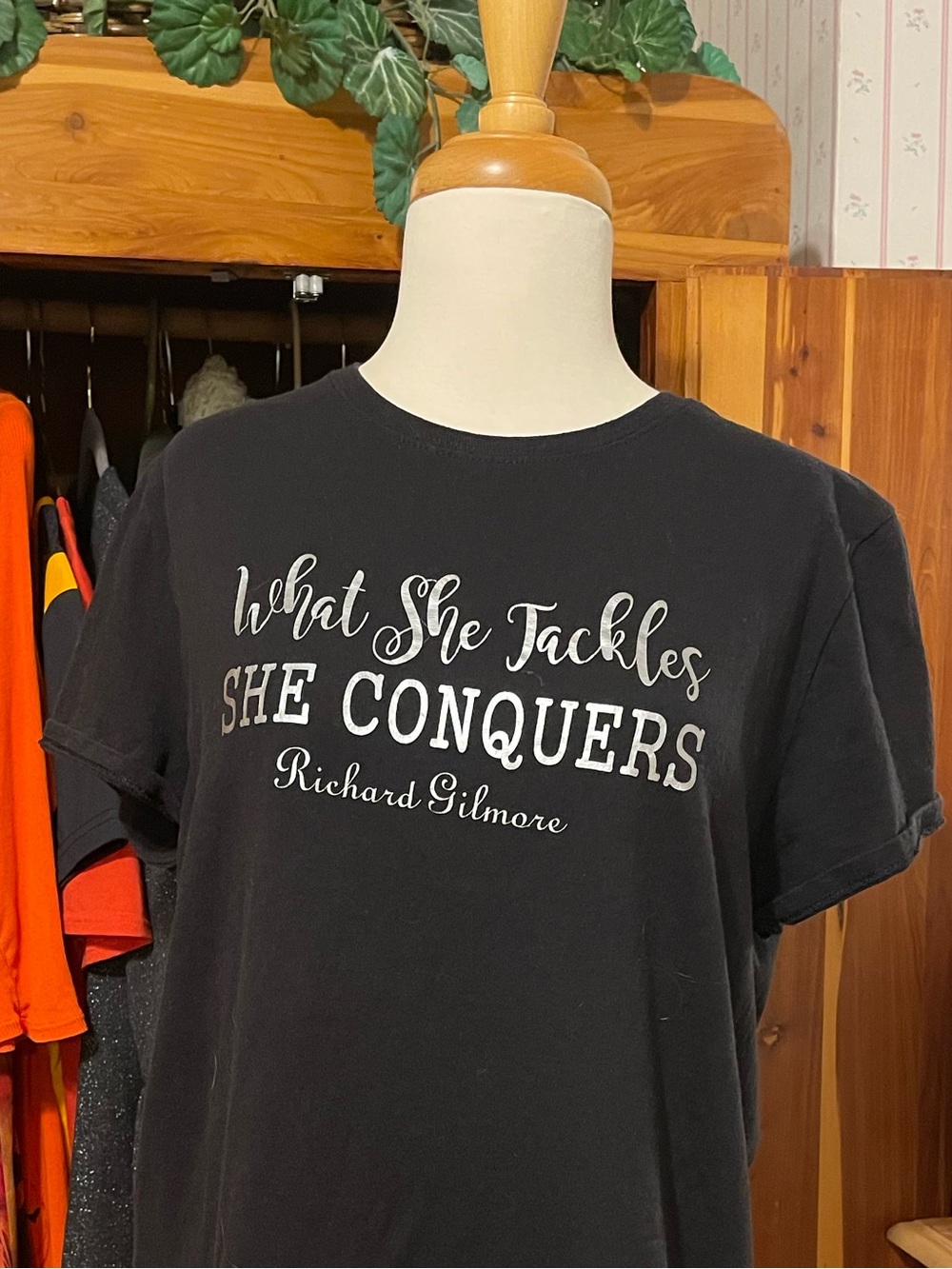 Black Graphic Tee - "What She Tackles She Conquers" Size L